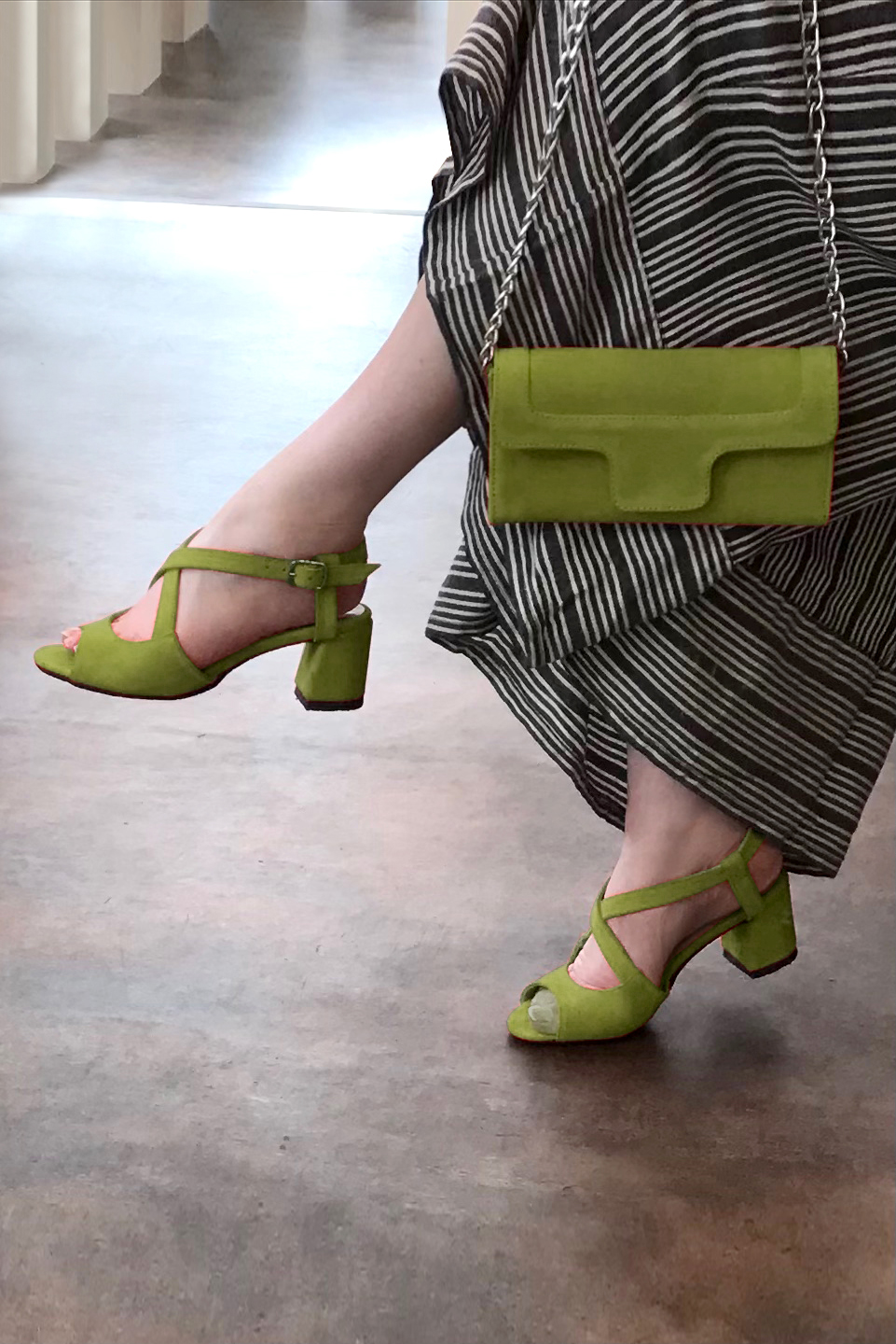 Pistachio green women's open back sandals, with crossed straps. Round toe. Medium flare heels. Worn view - Florence KOOIJMAN